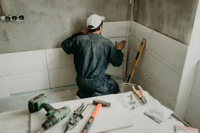 Bathroom tile installation by Builders Alexandra