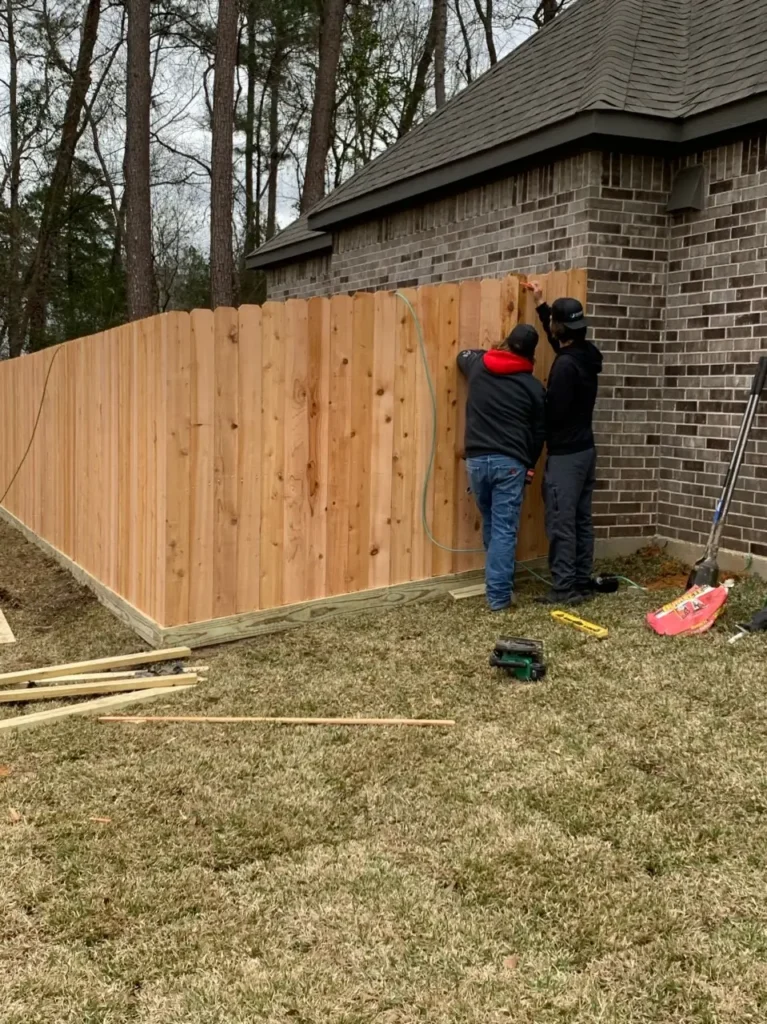 Builders Alexandra team installing wooden fencing for Fencing Alexandra.